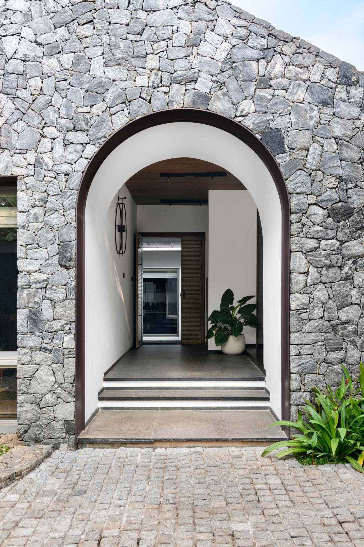 Entrance of The Hidden House by Aslam Sham Architects