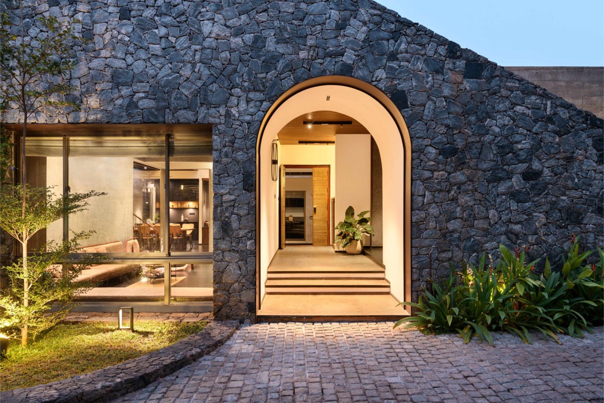 Dusk light exterior view of The Hidden House by Aslam Sham Architects
