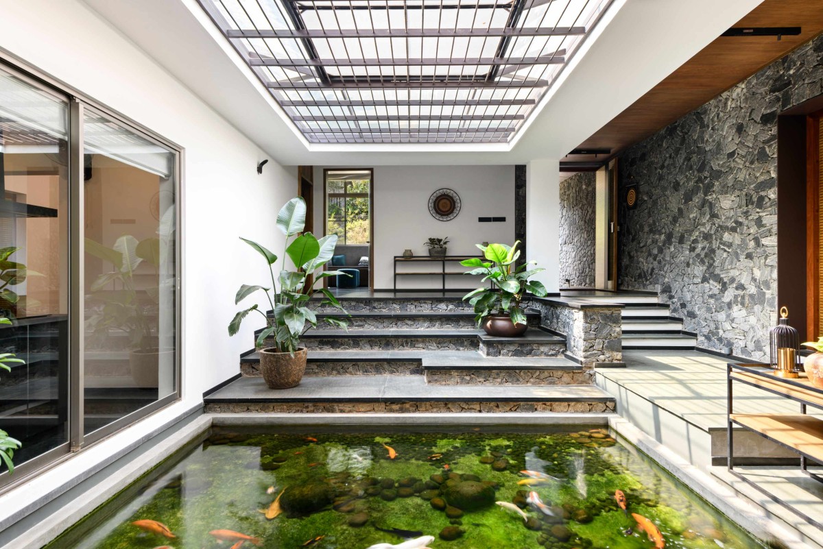 Courtyard of The Hidden House by Aslam Sham Architects