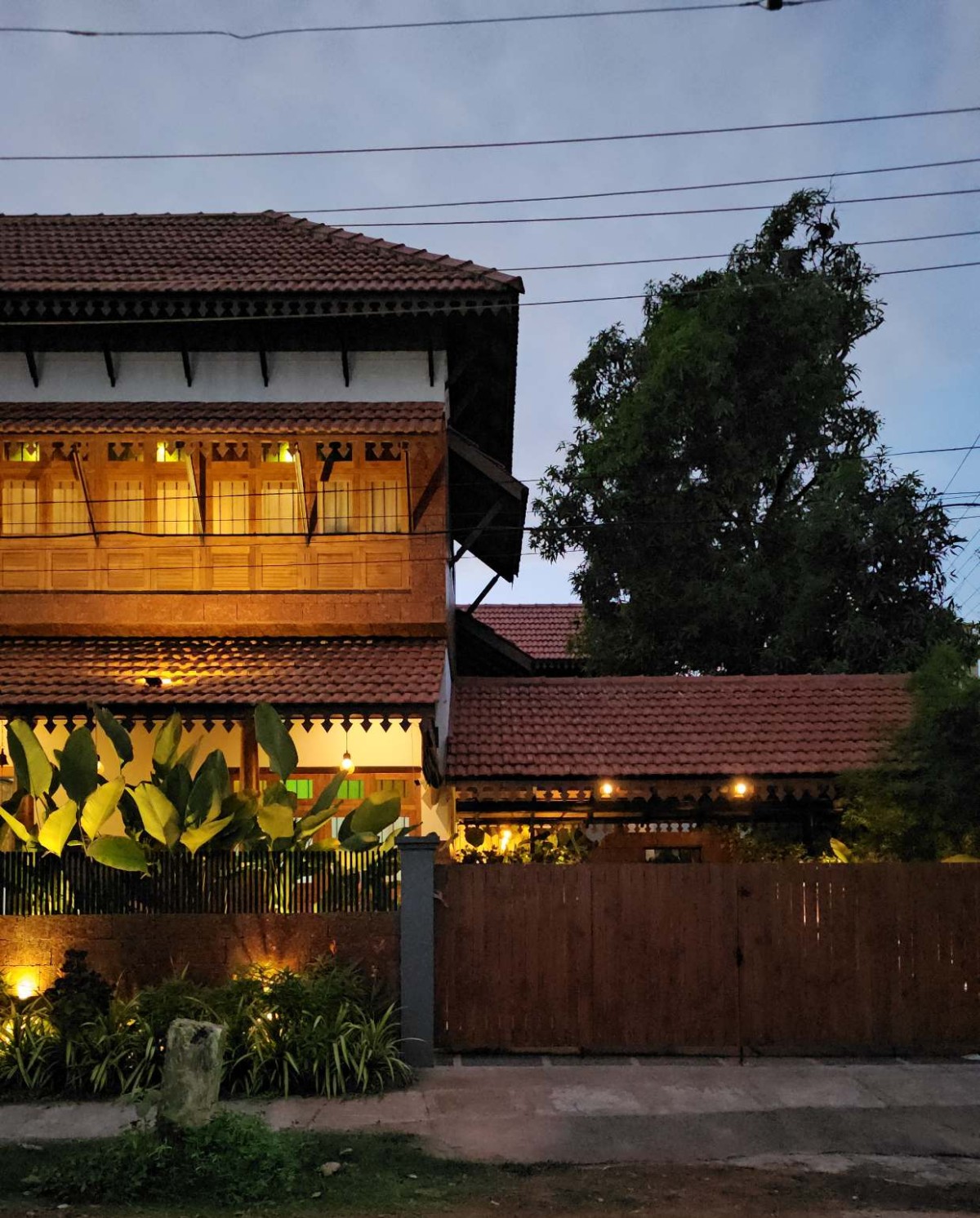 Dusk light exterior view of Sarada Vihar by 7th Hue Architecture Studio