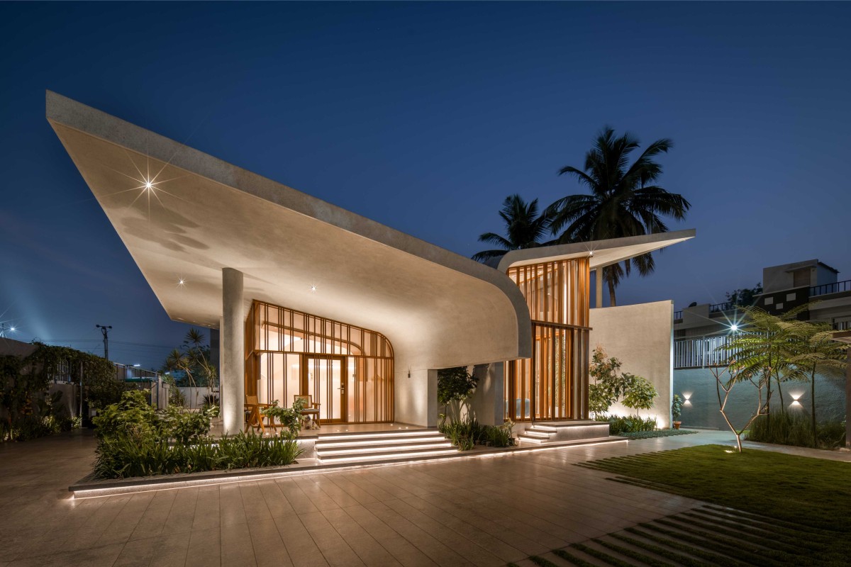 Dusk light exterior view of Hosapete Mane by Cadence Architects