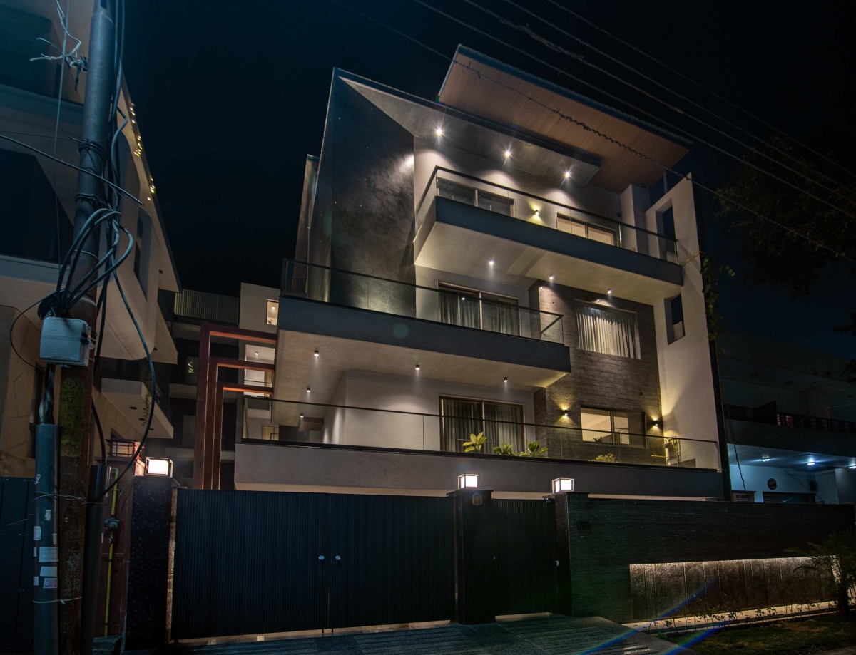 Night shot of exterior view of Contemporary House by Orionn Architects