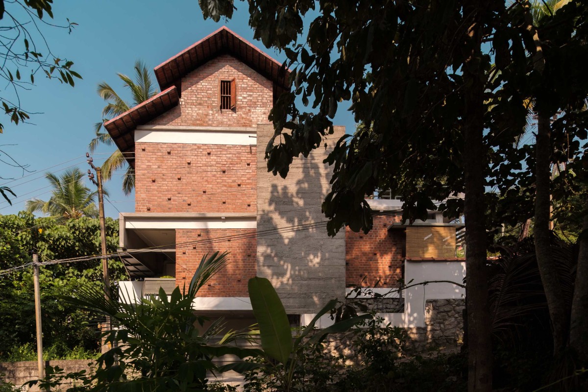 Exterior view of Idam- A house that calls back by Ishtika Design Studio