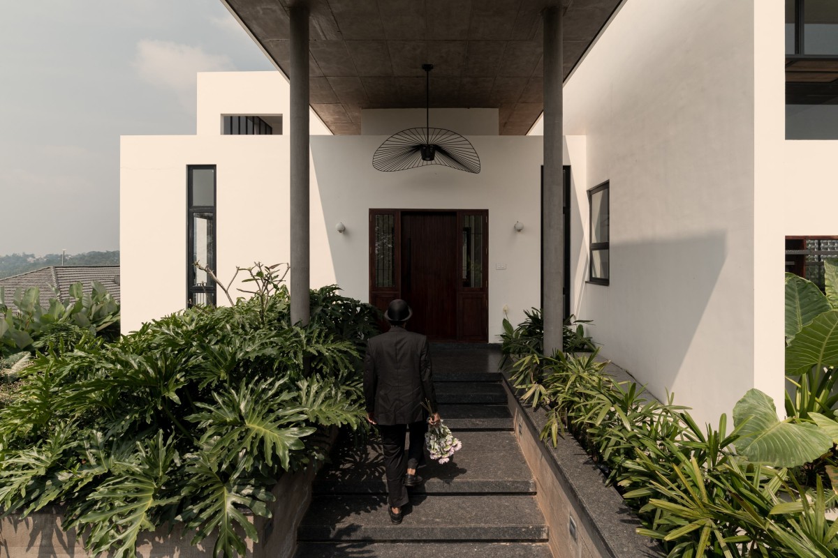 Entrance of Athira-Paras Residence by Studio Acis