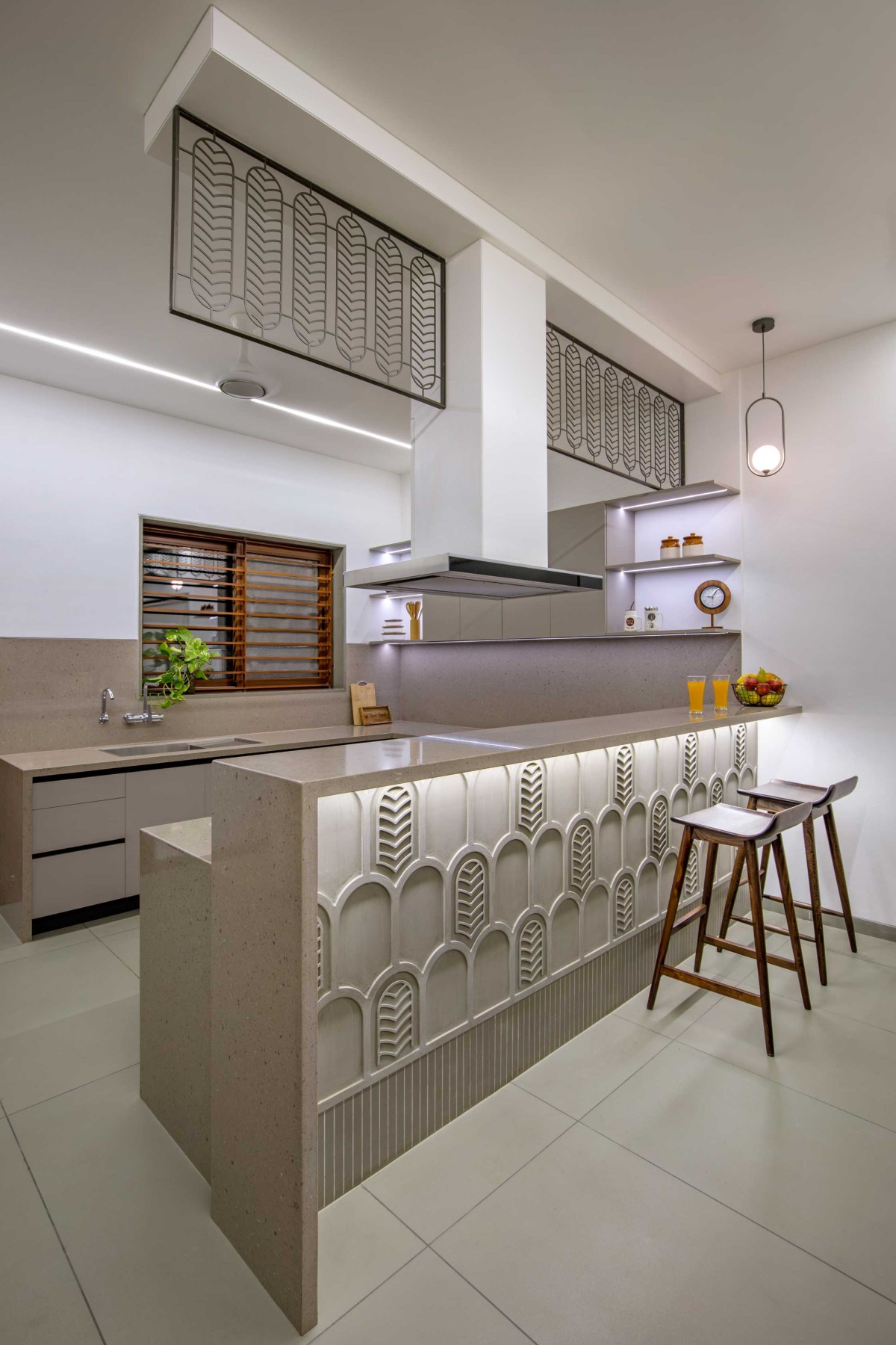 Kitchen of Concrete Screen Bungalow by DP Dimensions