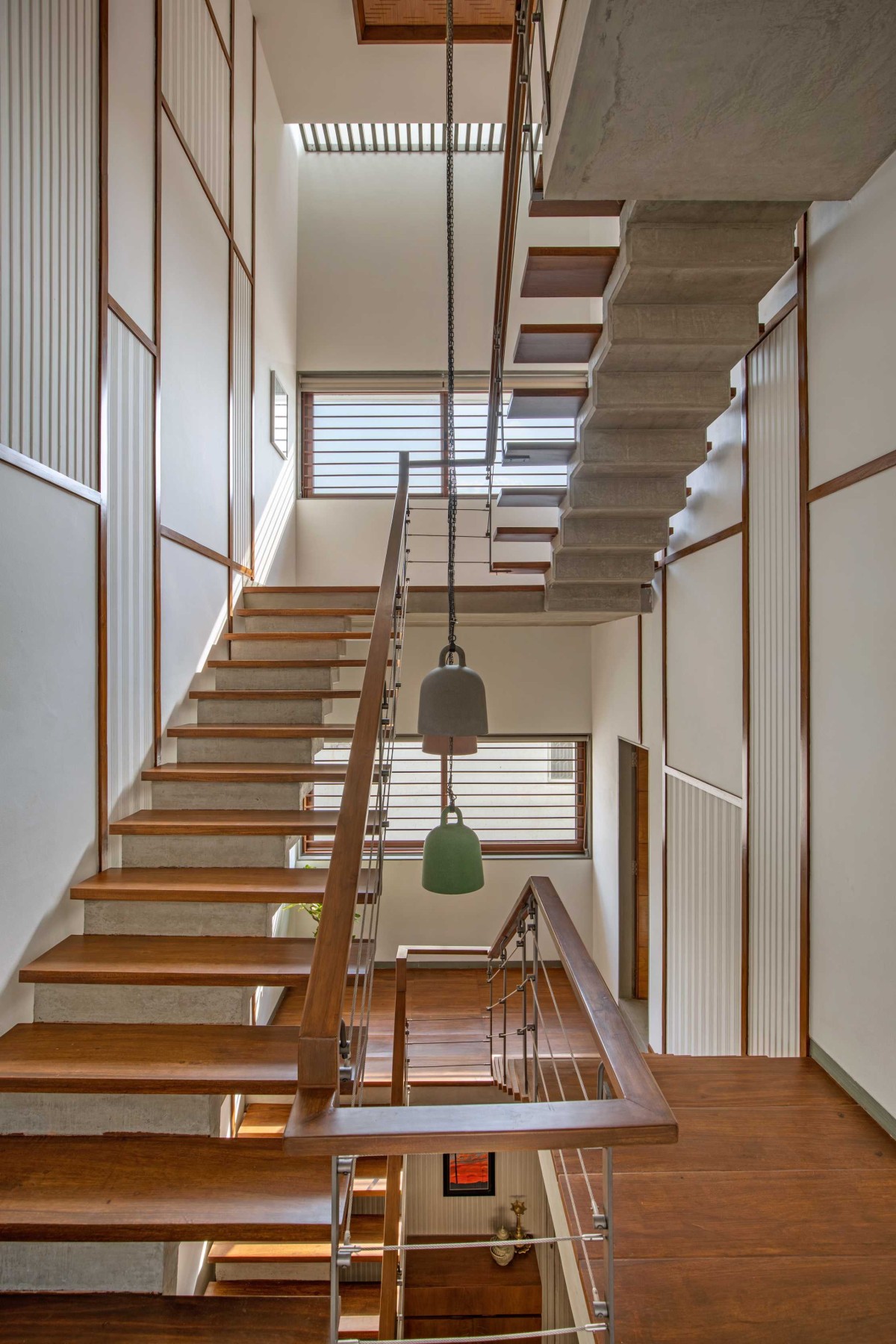 Staircase of Concrete Screen Bungalow by DP Dimensions