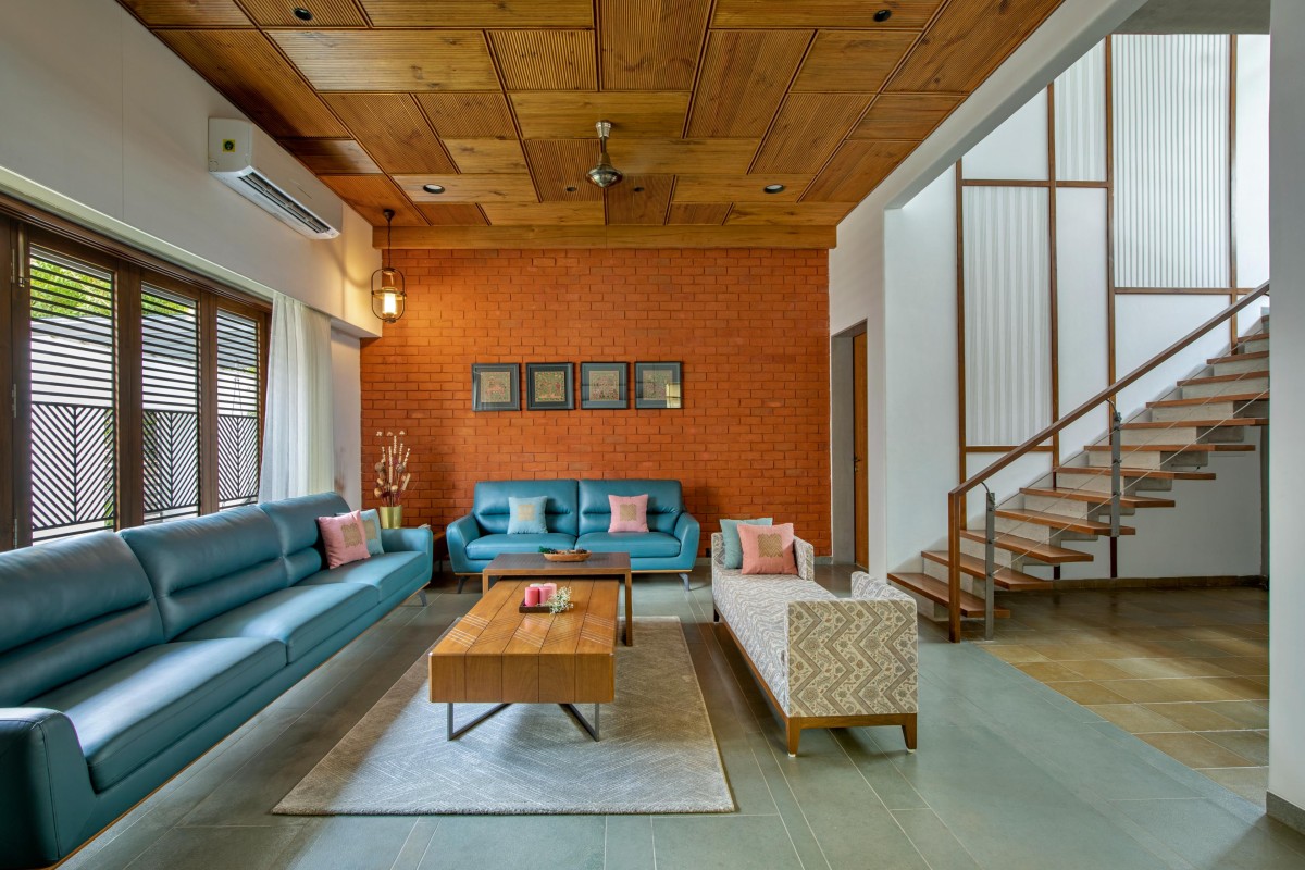 Living room of Concrete Screen Bungalow by DP Dimensions