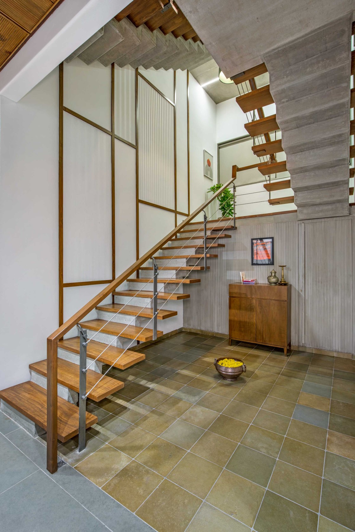 Staircase of Concrete Screen Bungalow by DP Dimensions