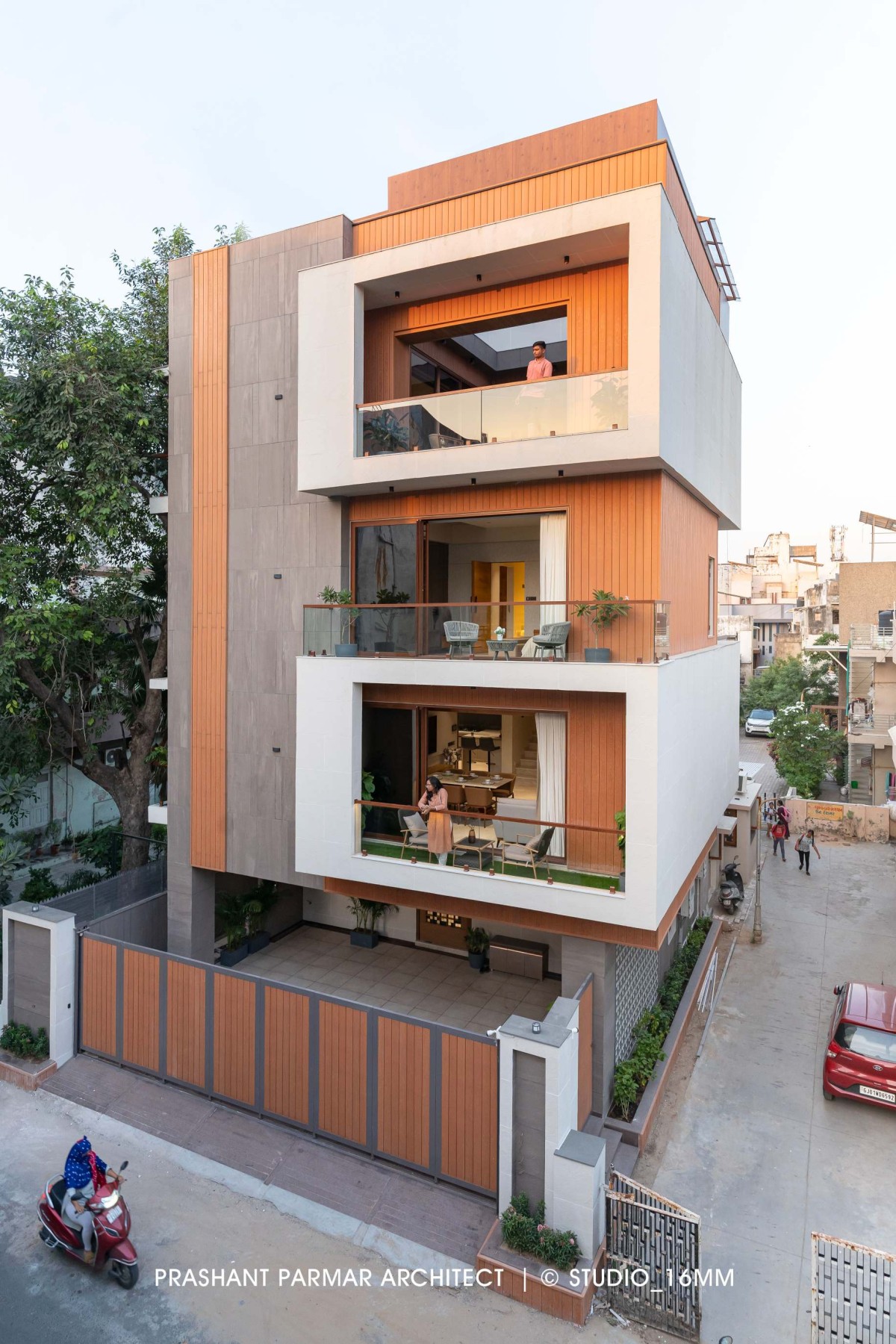 Exterior view of Elevated Compact House by Prashant Parmar Architect  Shayona Consultant