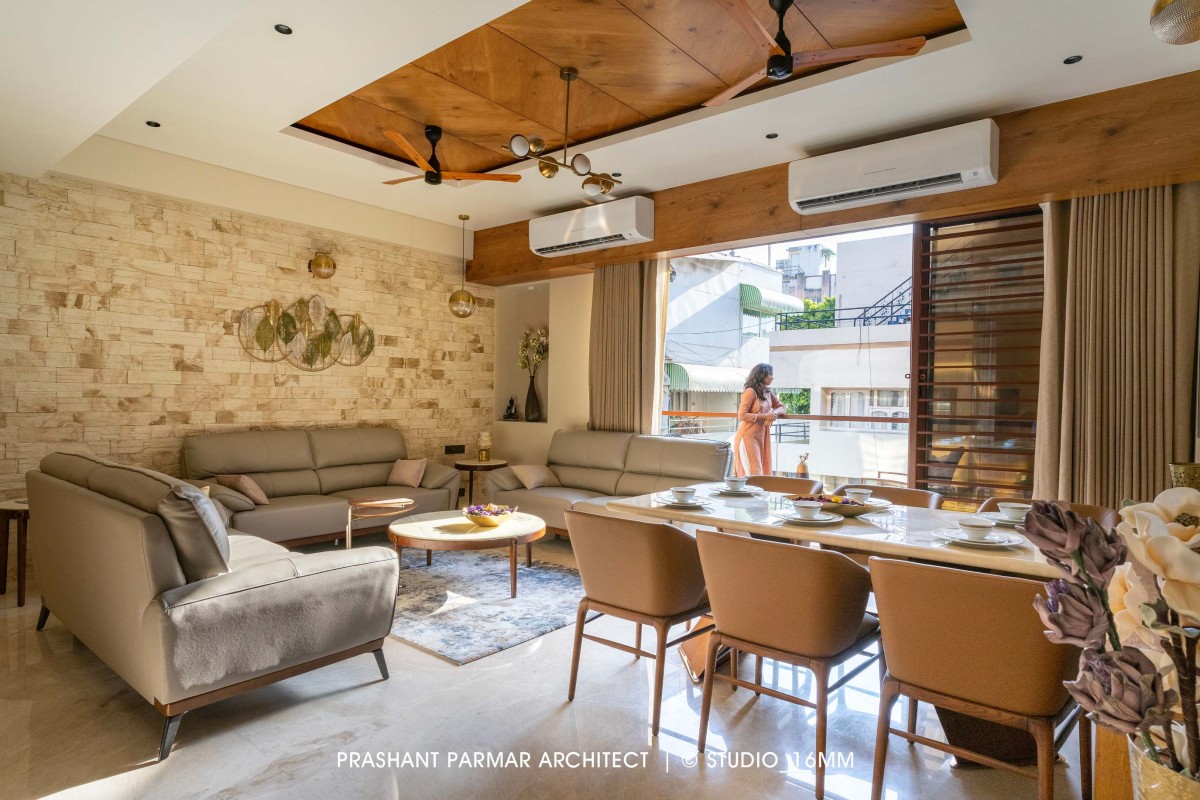 Living and Dning of Elevated Compact House by Prashant Parmar Architect  Shayona Consultant