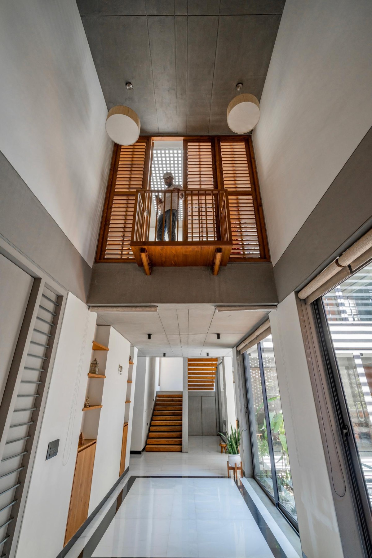 Passage to staircase of An Urban House by MISA Architects