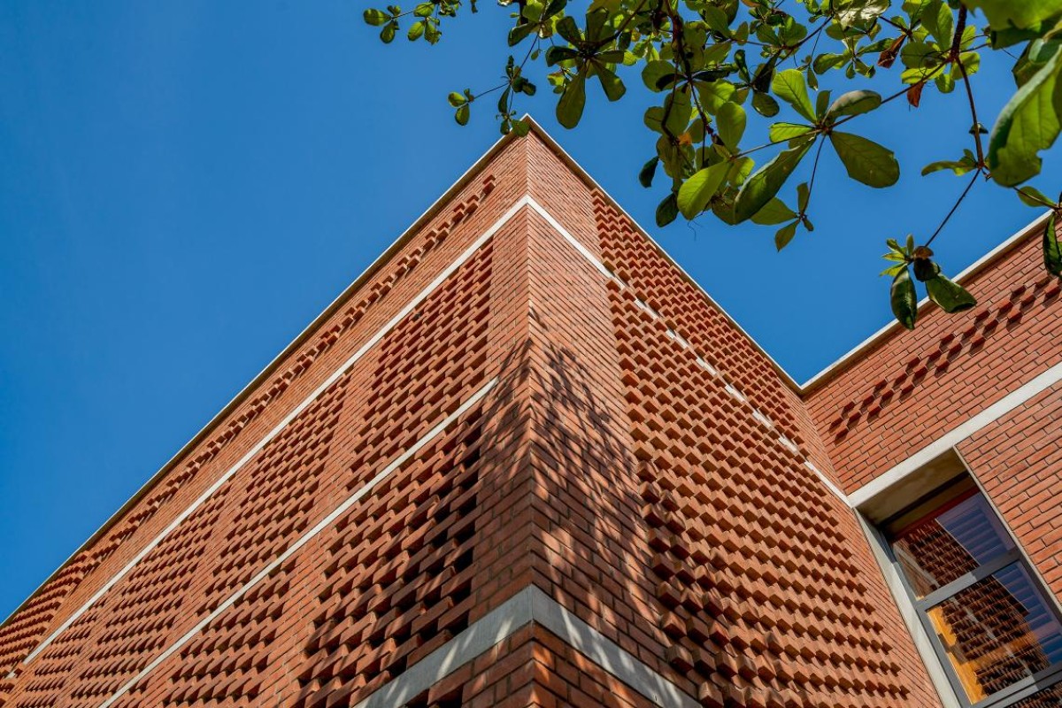 Detailed shot of exterior brick wall of An Urban House by MISA Architects