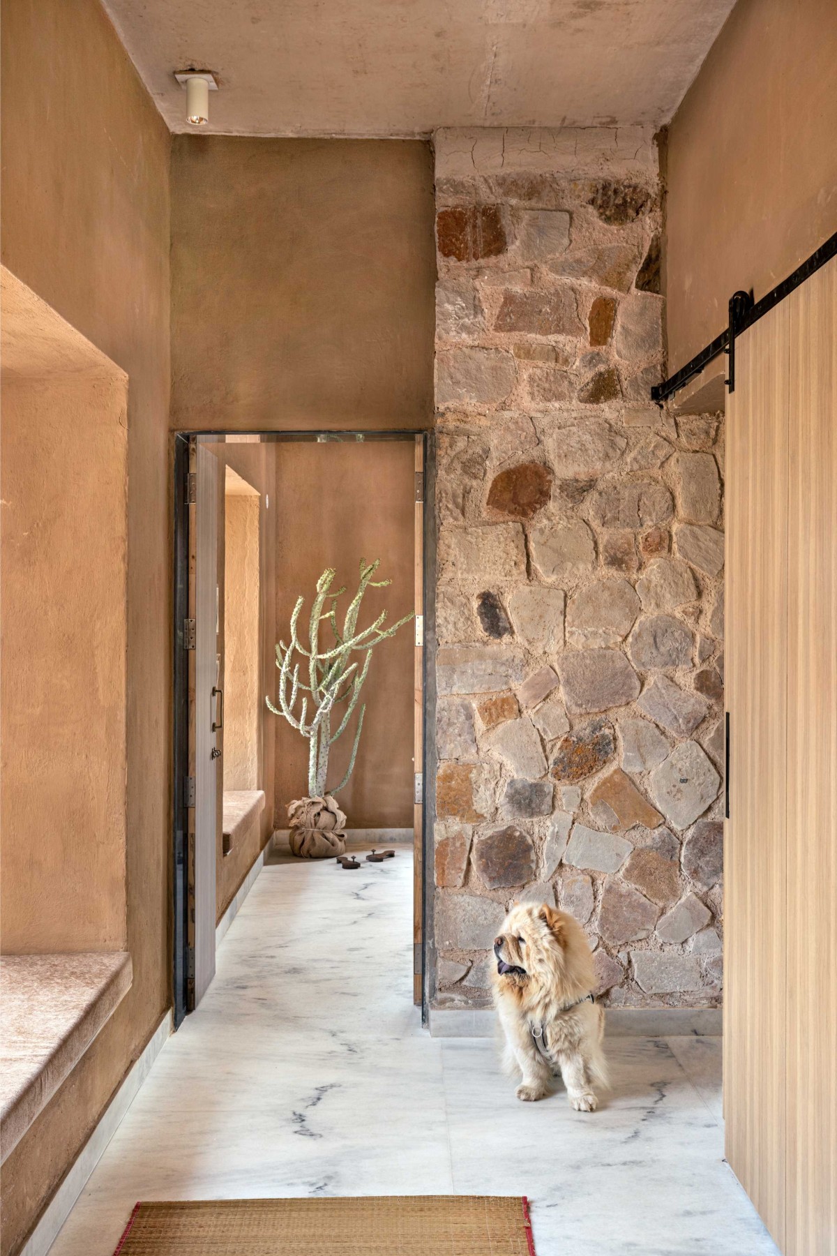 Passage of Stone House by Sketch Design Studio