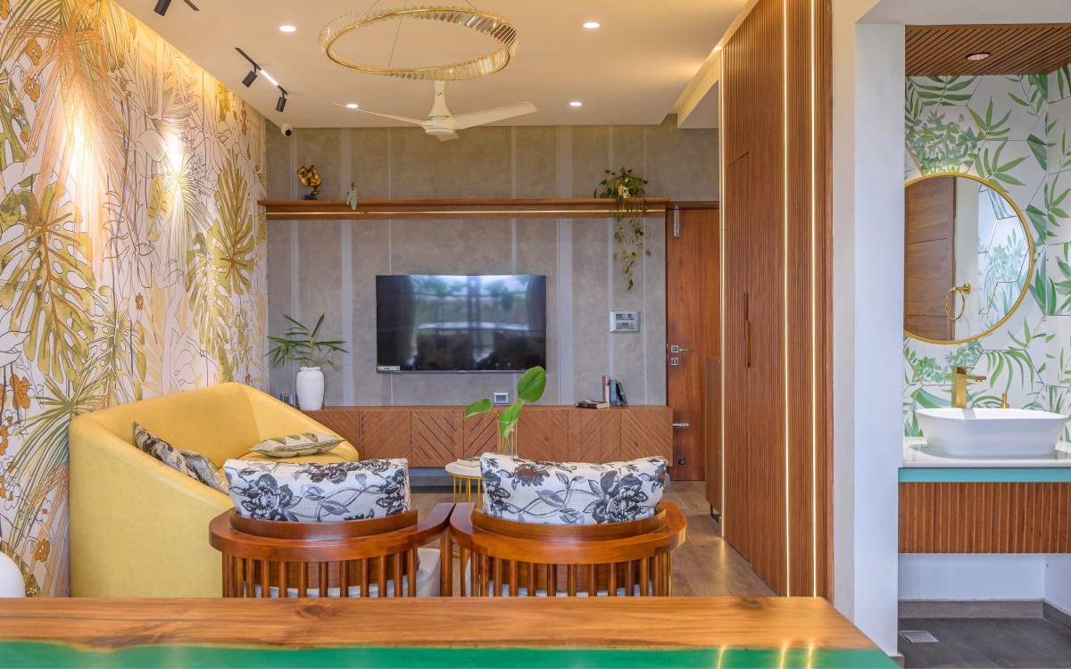 Living room of Tropical Encase by Urban Hive