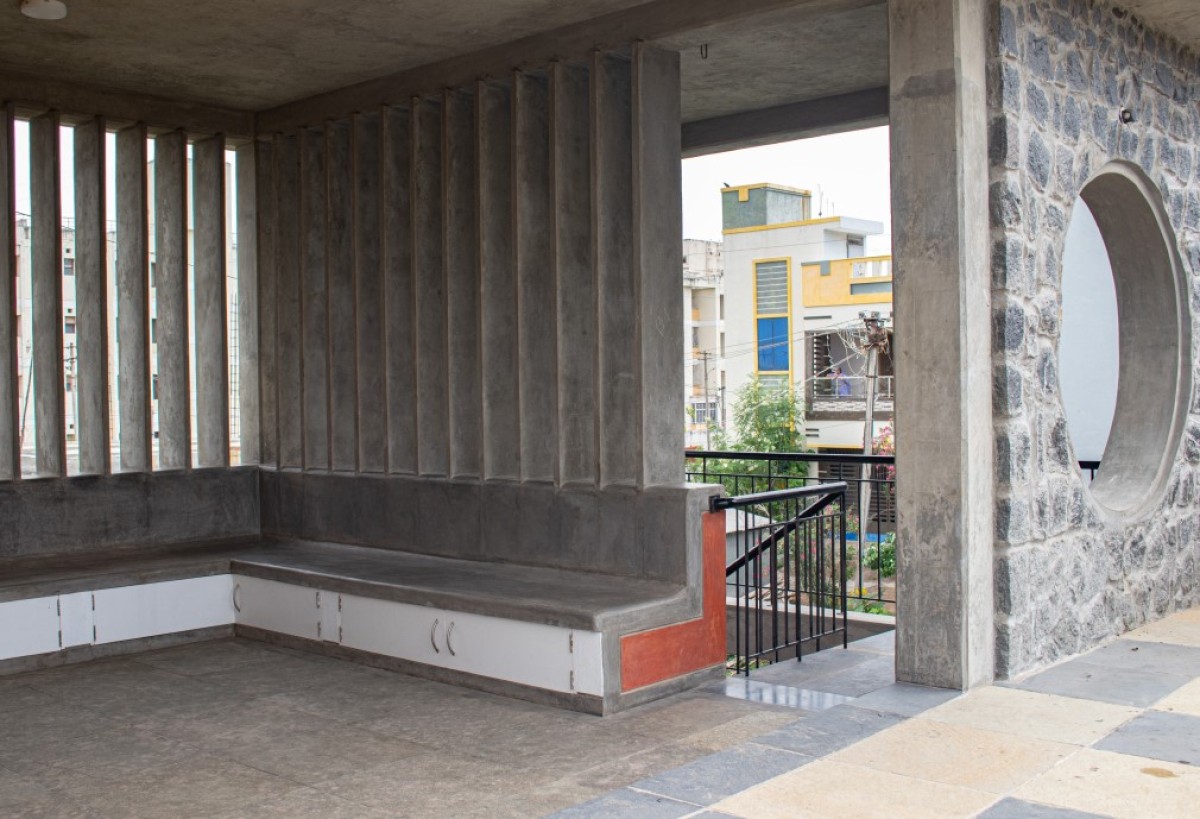 Semi covered seating at first floor of Alamu Nilayam by RP Architects
