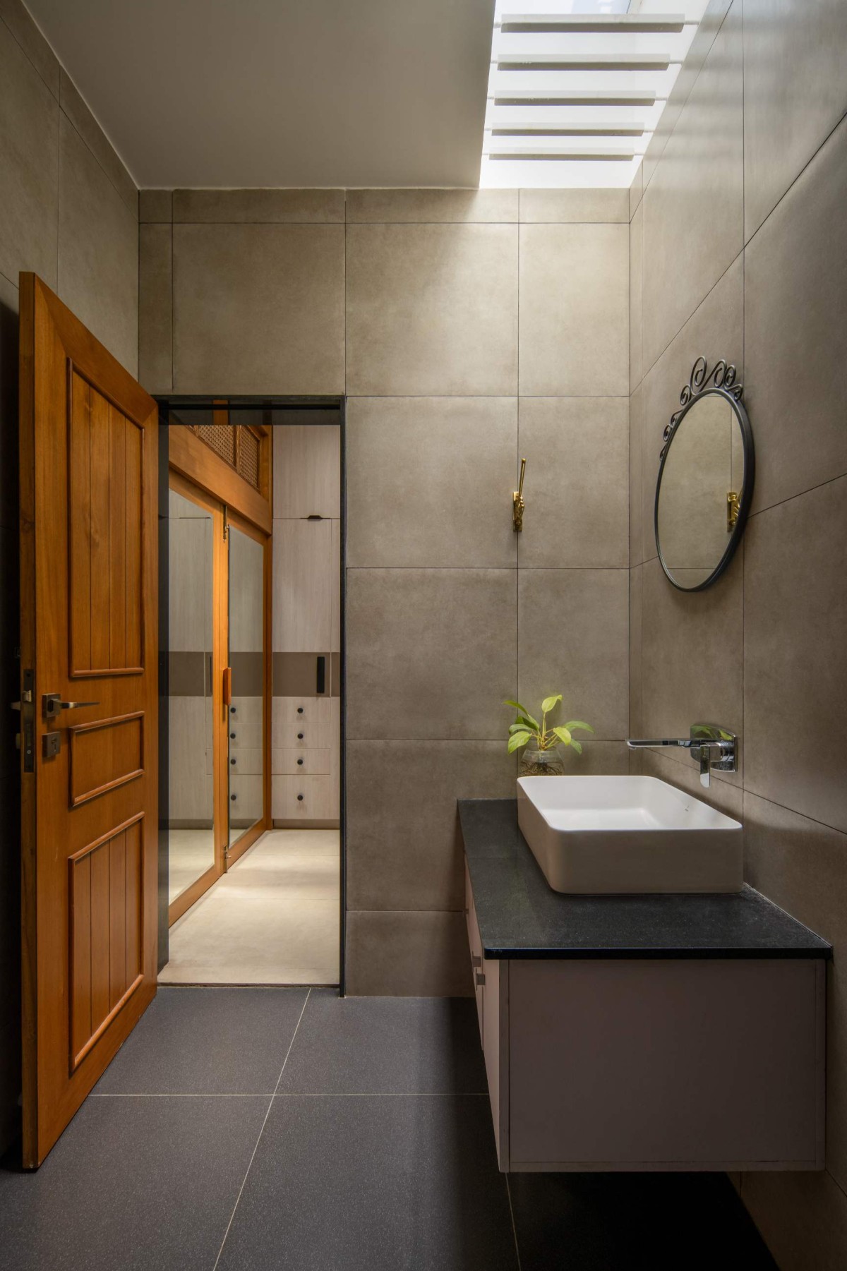 Washroom of Brindavana Residence by Veerajshet Design Studio