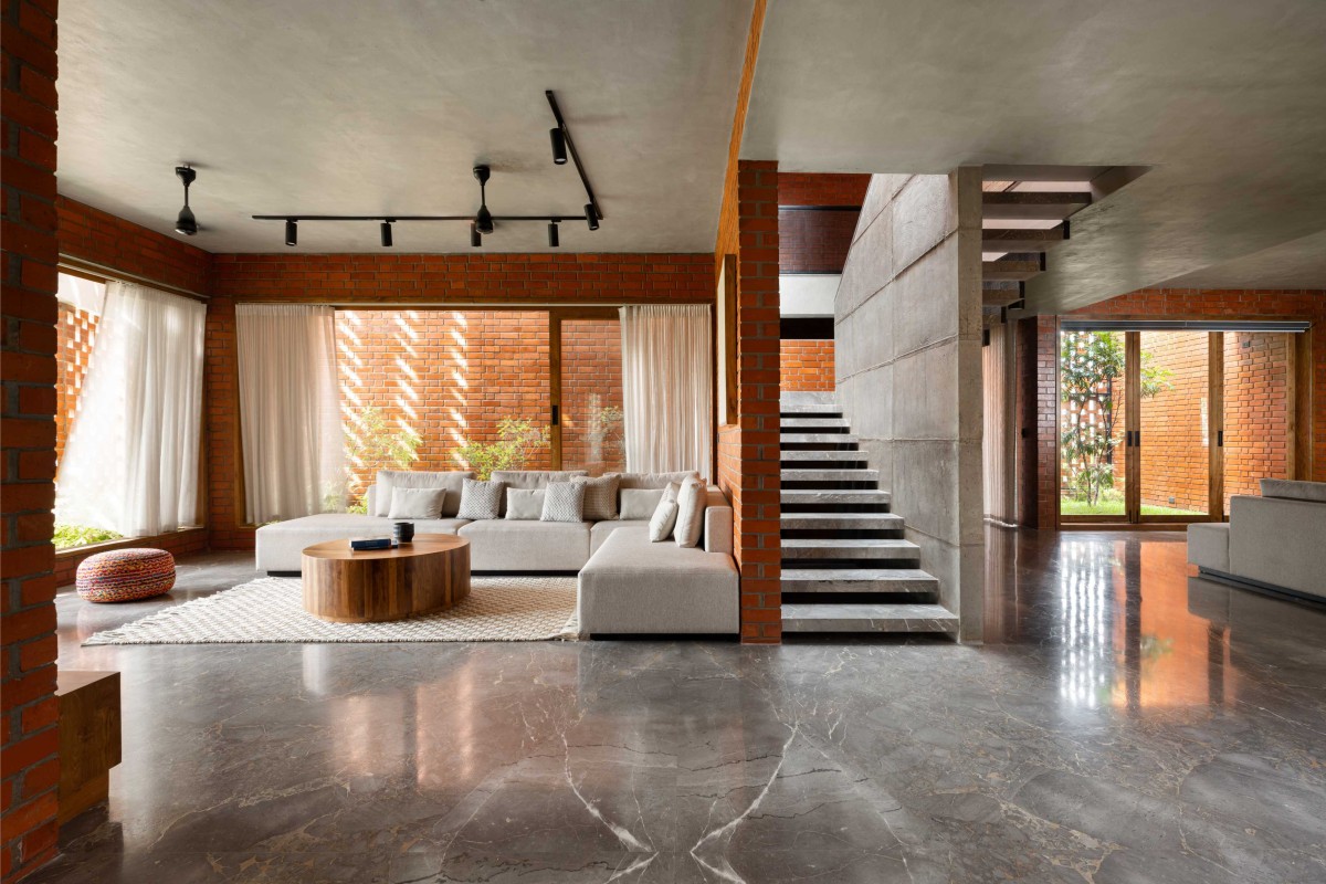 Living room and Staircase of The Kenz House by Srijit Srinivas Architects