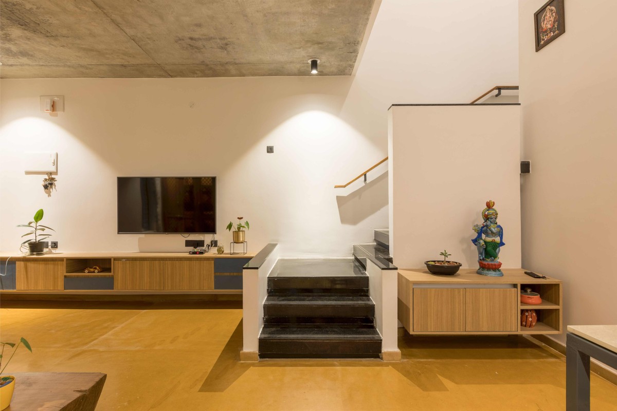 Living and Pooja area of Brick House by Studio 1008