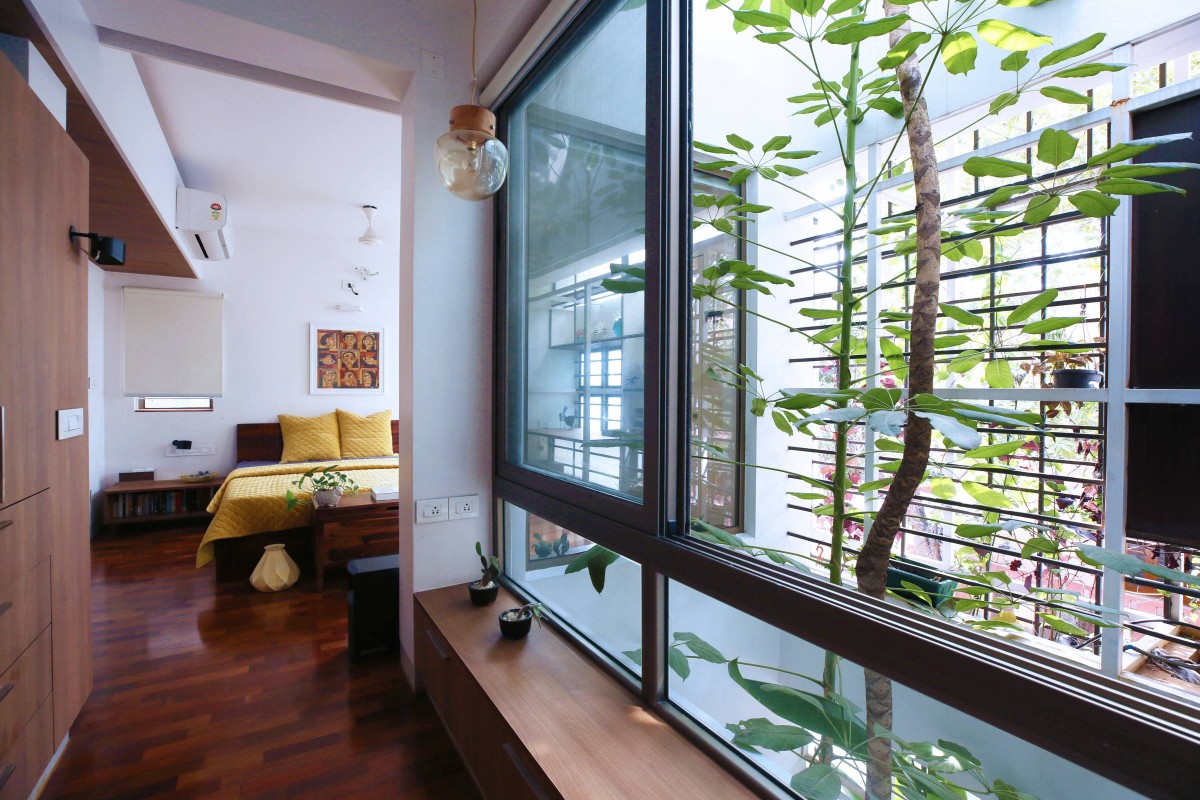 The Tree Cut Out and the Closet Area in Master Bedroom of Aadyam by Gaurav Roy Choudhury Architects