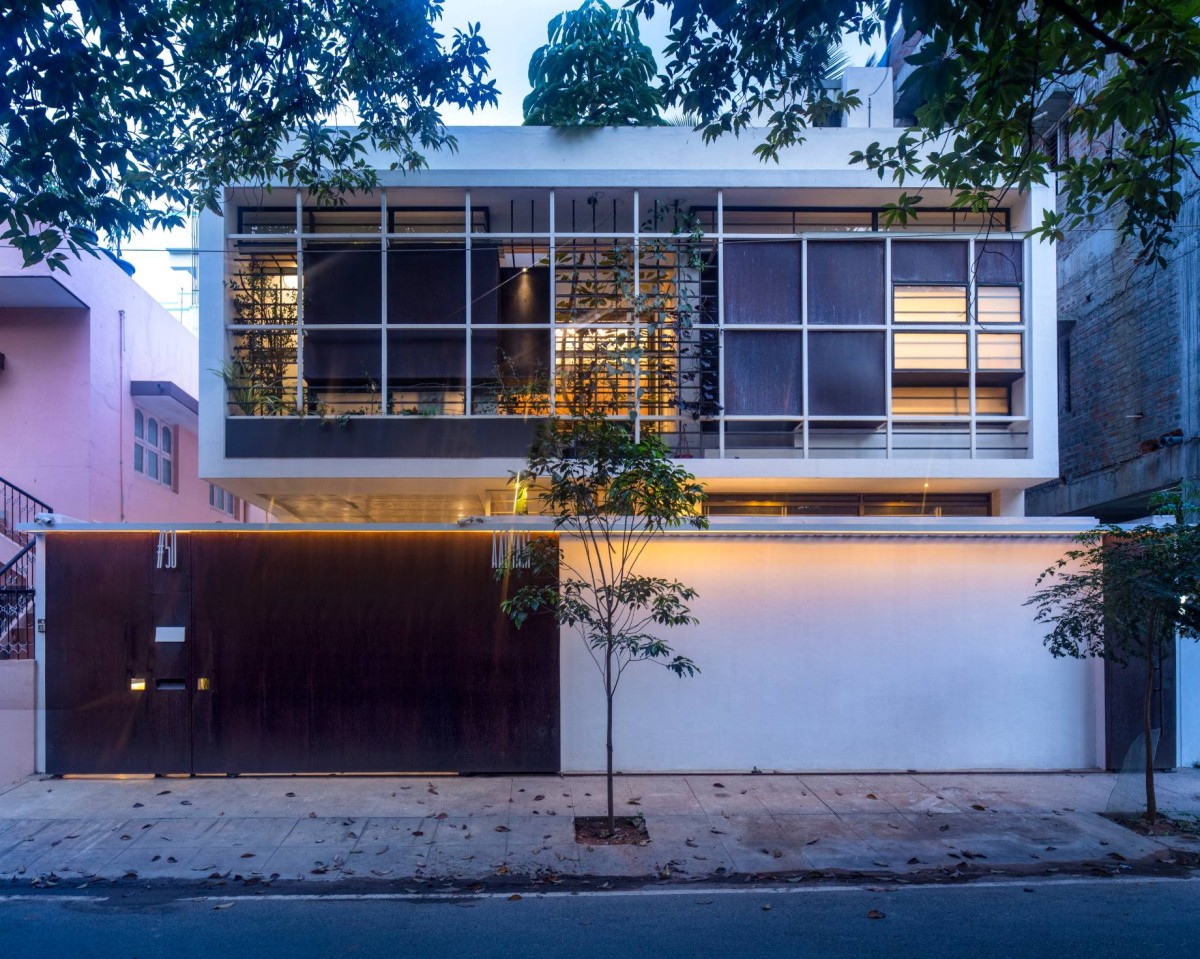 Front Street View at dusk of Aadyam by Gaurav Roy Choudhury Architects
