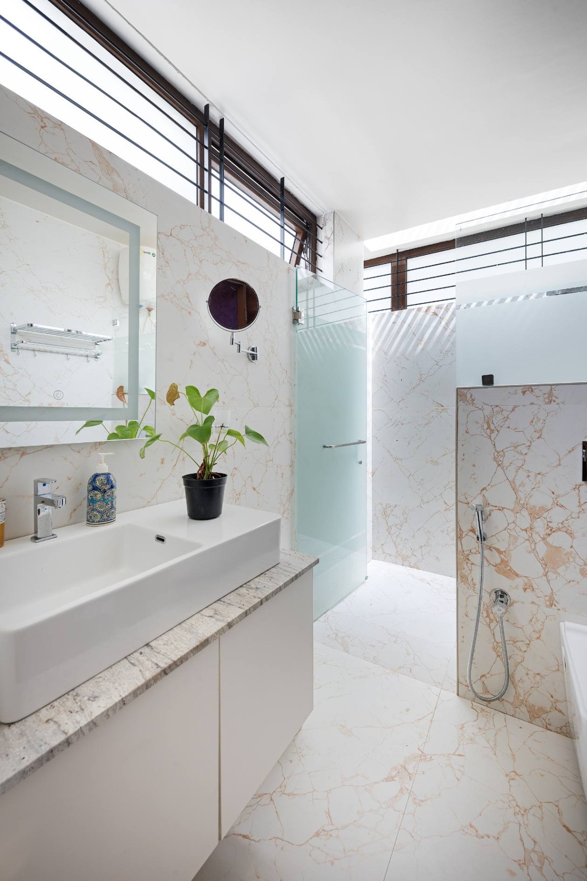 Master Bathroom of Twin Courtyard House by ID+AS Architects