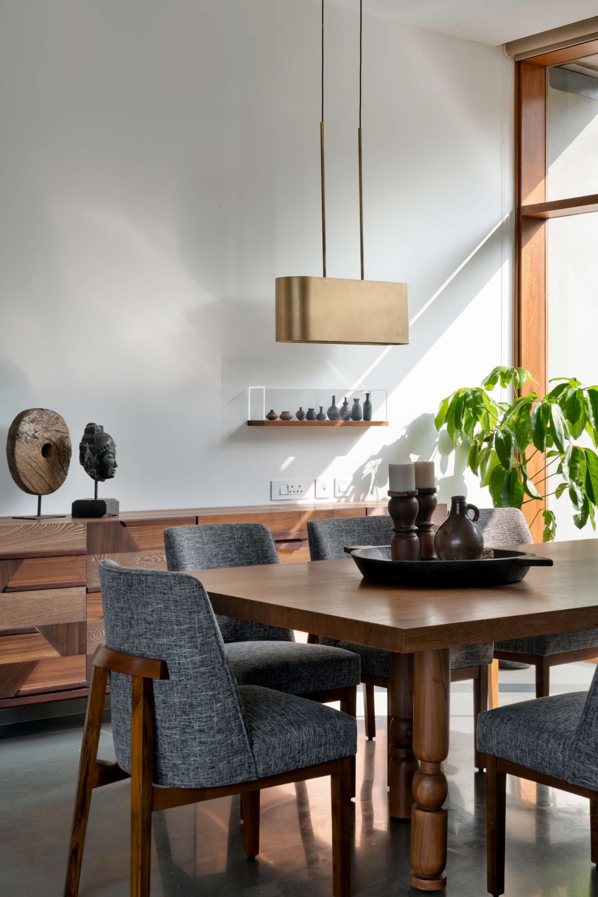 Dining area of Hovering House of Parikhs by Anarr Gunjaria Interiors and Modo Design