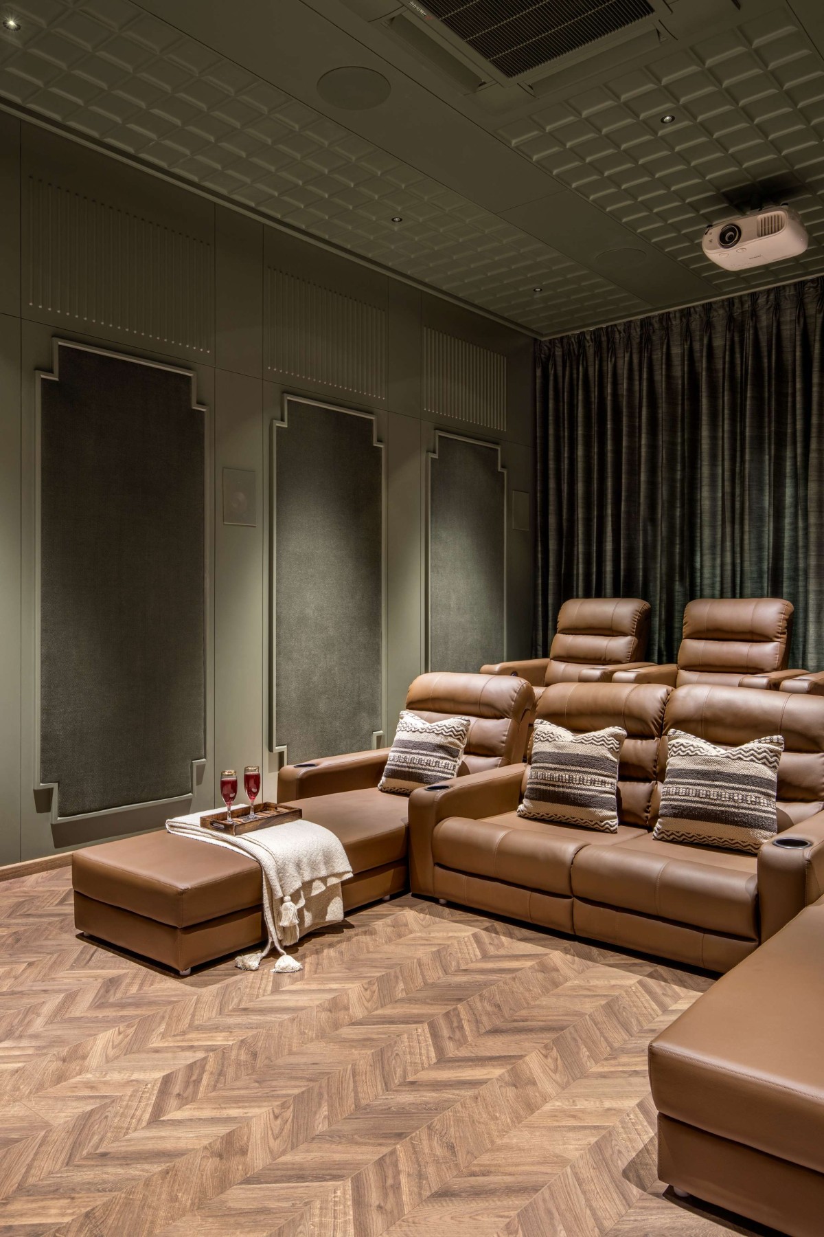 Home Theater of 16 Screens House by A+T Associates