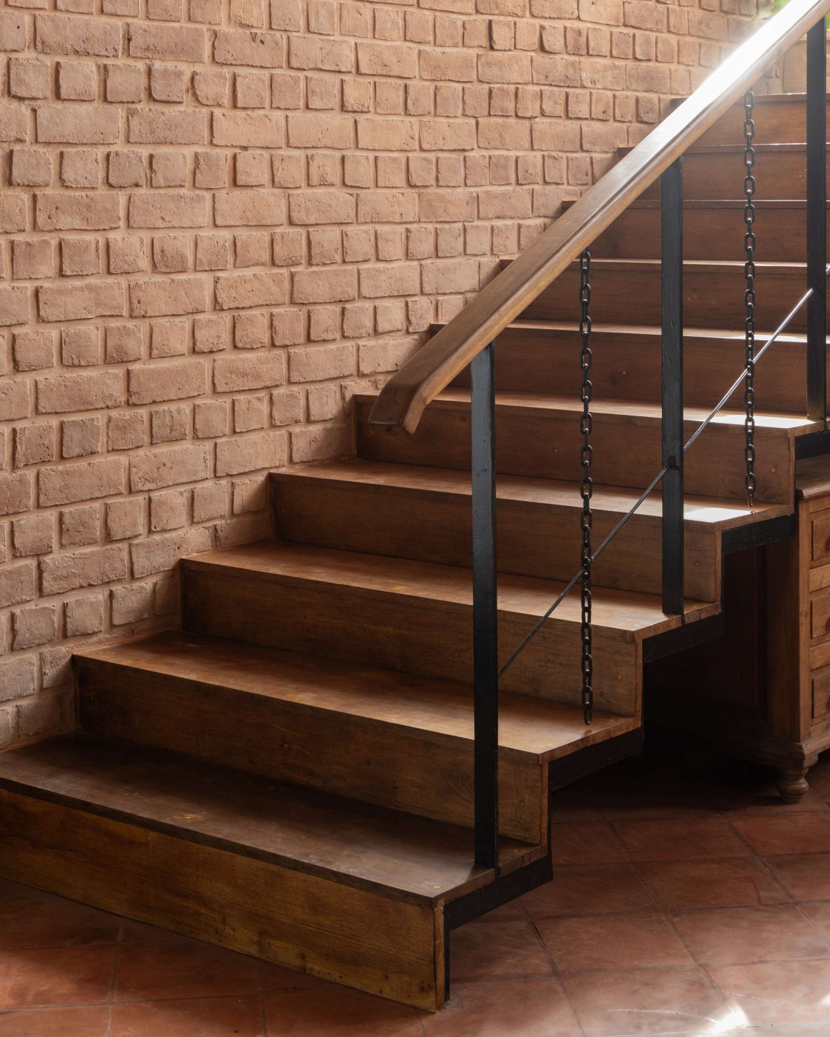 Staircase of Brick Manor by Bhutha Earthen Architecture Studio