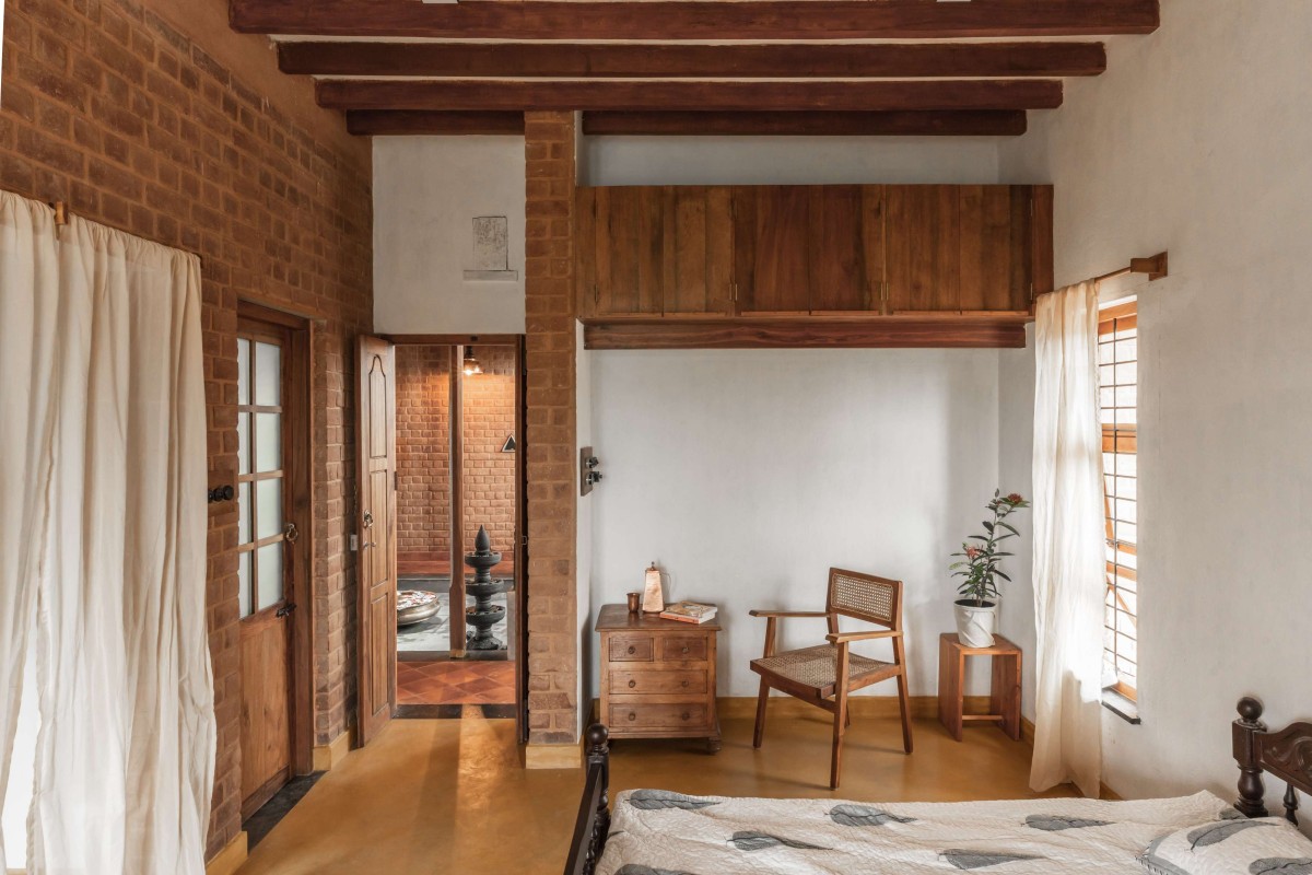 Bedroom of Brick Manor by Bhutha Earthen Architecture Studio