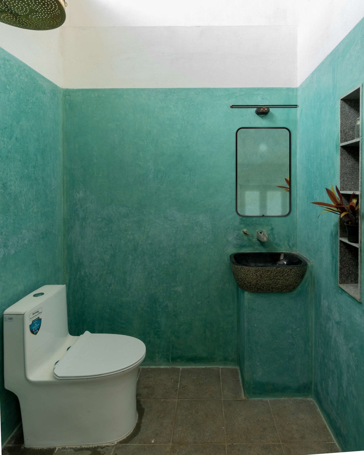Toilet of Brick Manor by Bhutha Earthen Architecture Studio