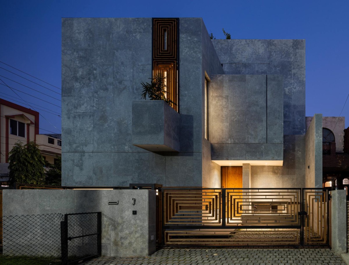 Dusk light exterior view of House Within by Arch.Lab