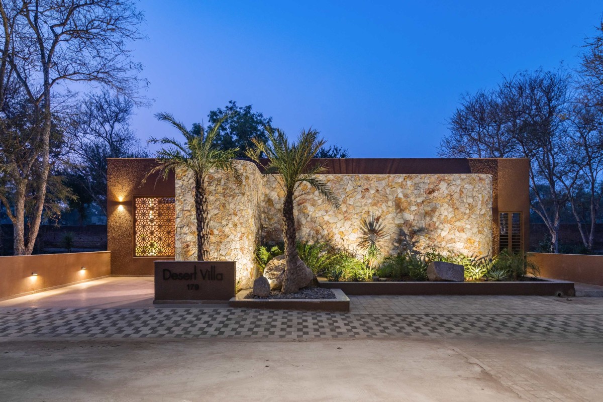Dusk light exterior view of Desert Villa by Ace Associates