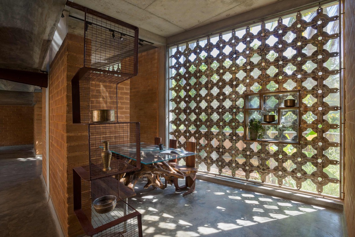 Dining Area with Scrap Window Grill of Iha Residence by Wallmakers