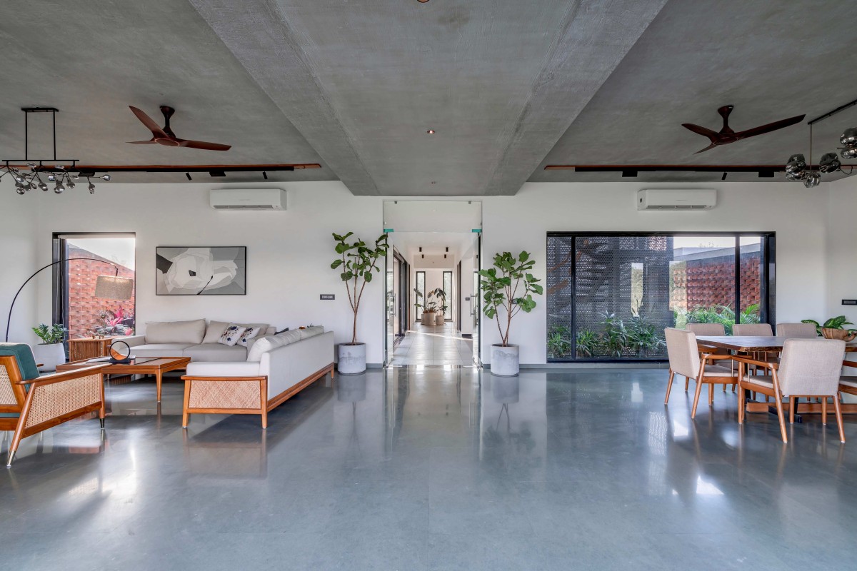 Living and Dining of Agrawal Farm by Urbscapes