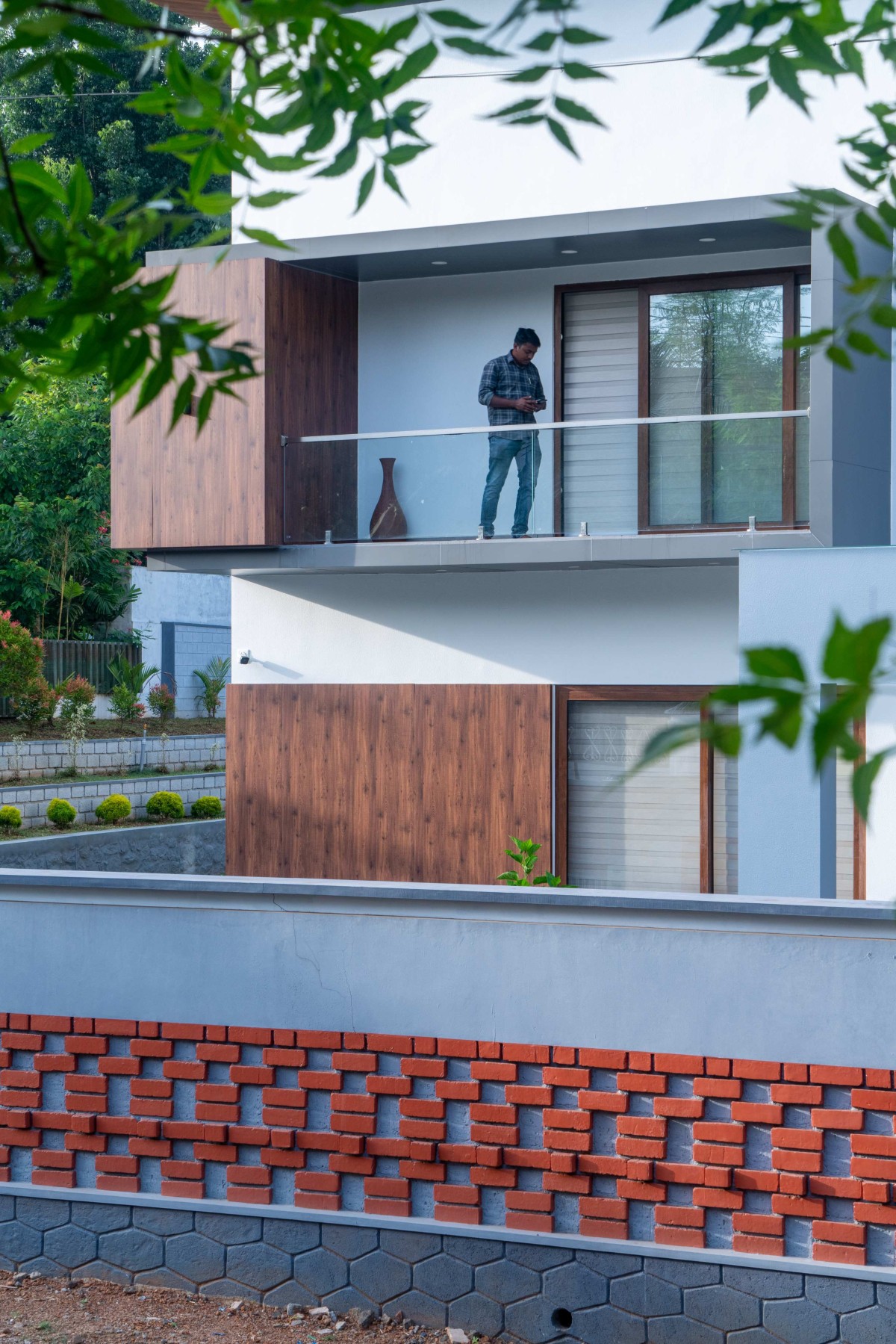 Balcony of Kevin Villa by Nature's Craft Architecture Studio