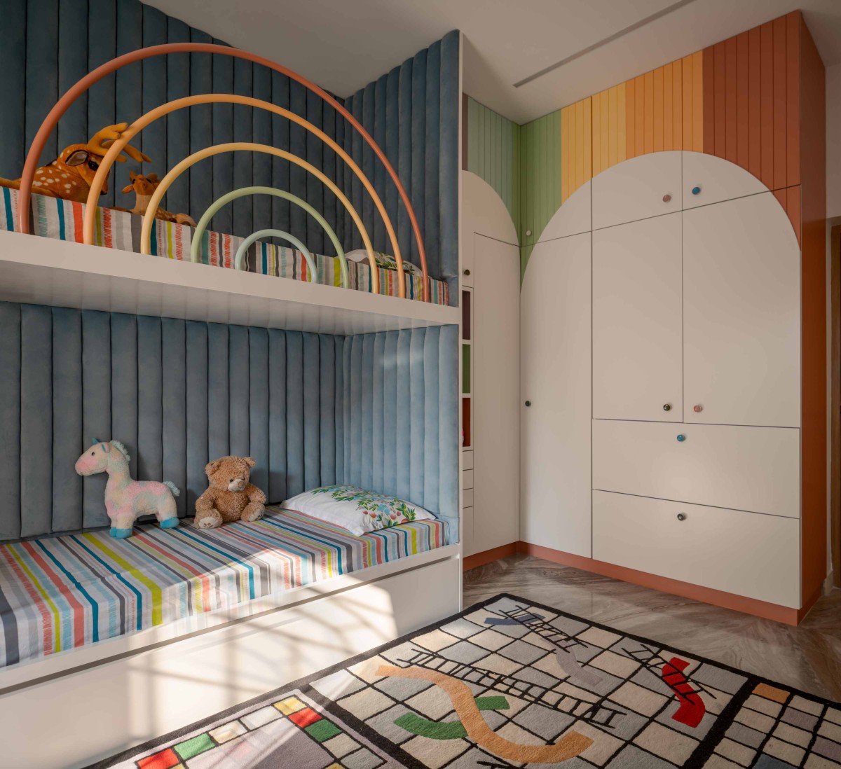 Double Decker bed for the kids bedroom with pastel colours and geometries