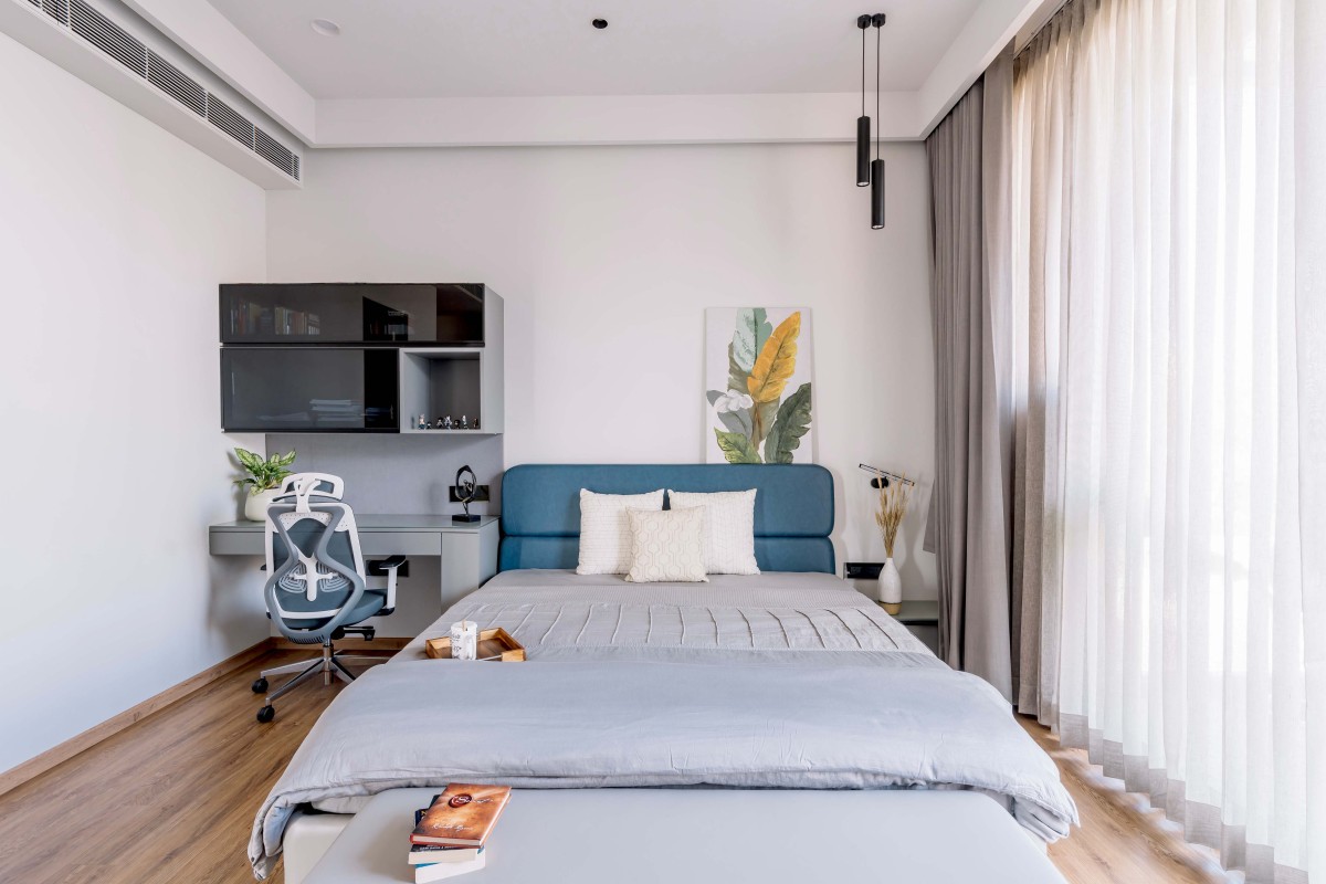 Bedroom 2 of The Concrete Tree House by Architects at Work