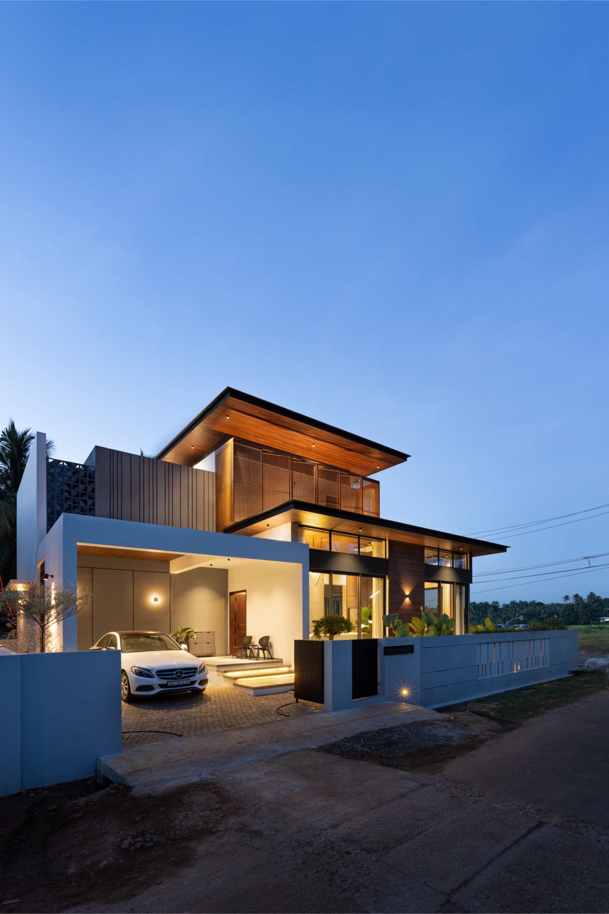 Dusk light exterior view of Open Sky Residence by Muaz Rahman Architects