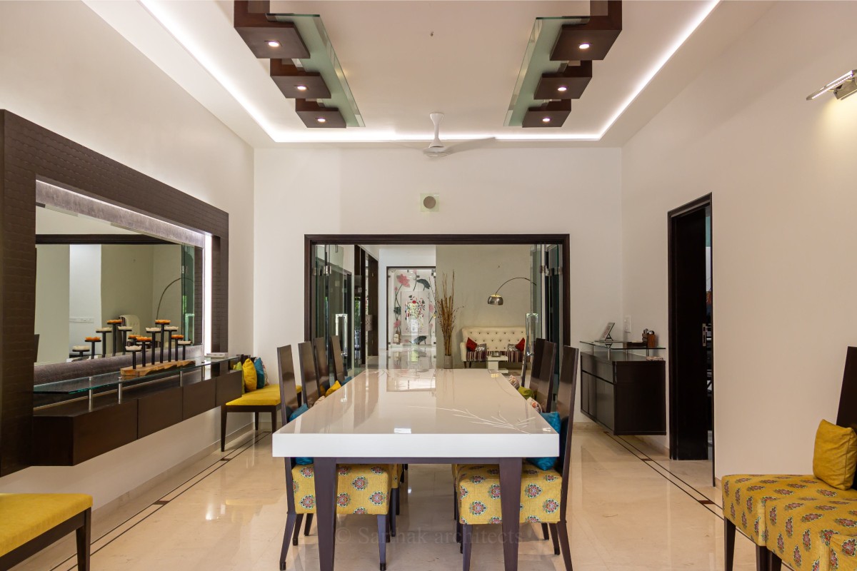 Dining of Mr. Shah's Bungalow by Sarthak Architects & Interior Designers