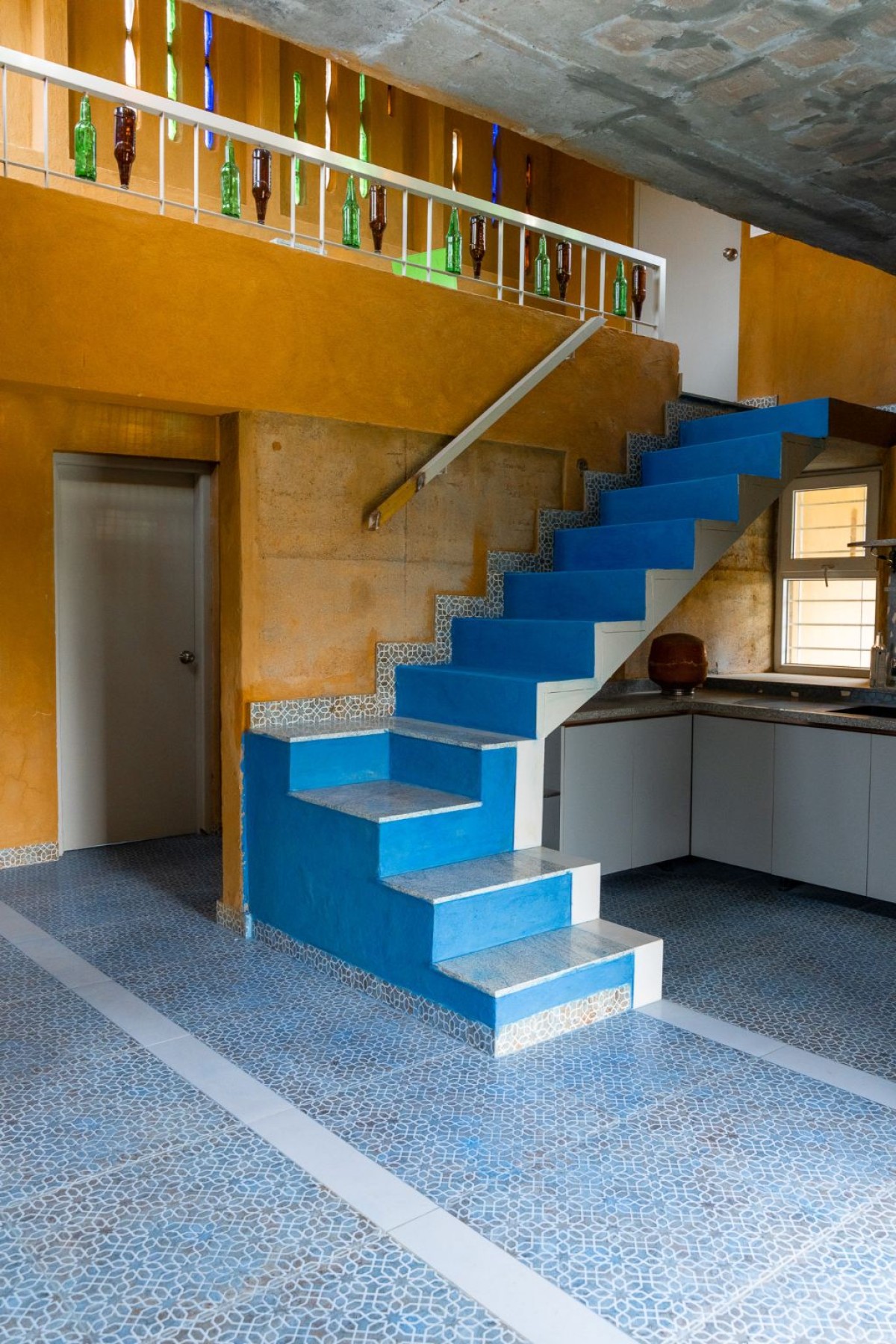 Staircase of Composite Earth Farmhouse by Studio Verge