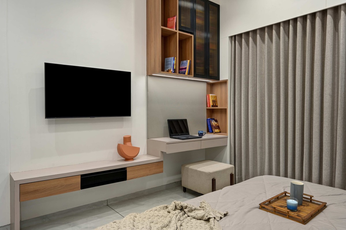 Grandparents Bedroom, Study area and TV Unit of Humble Abode by Woodpeckers Studio