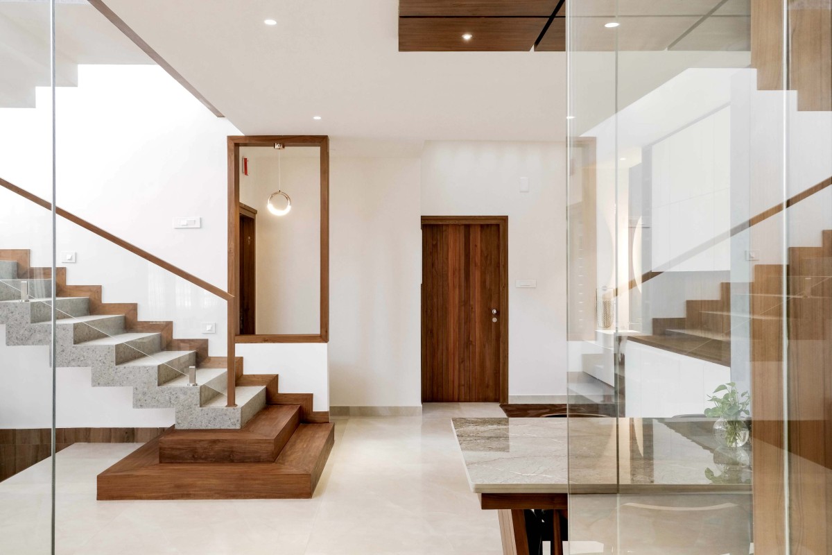 Passage to staircase of Jibens Home by S&A Architects