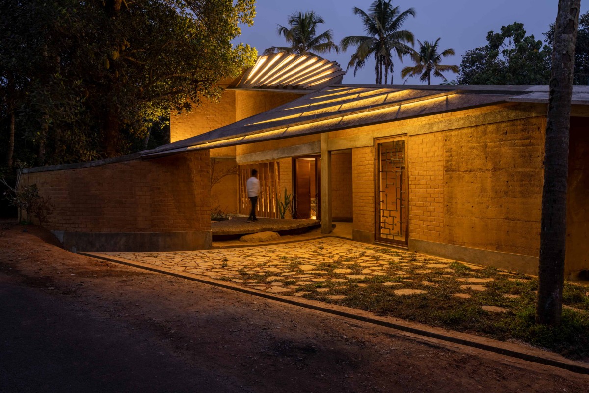 Dusk light exterior view of Jack Fruit Garden Residence by Wallmakers