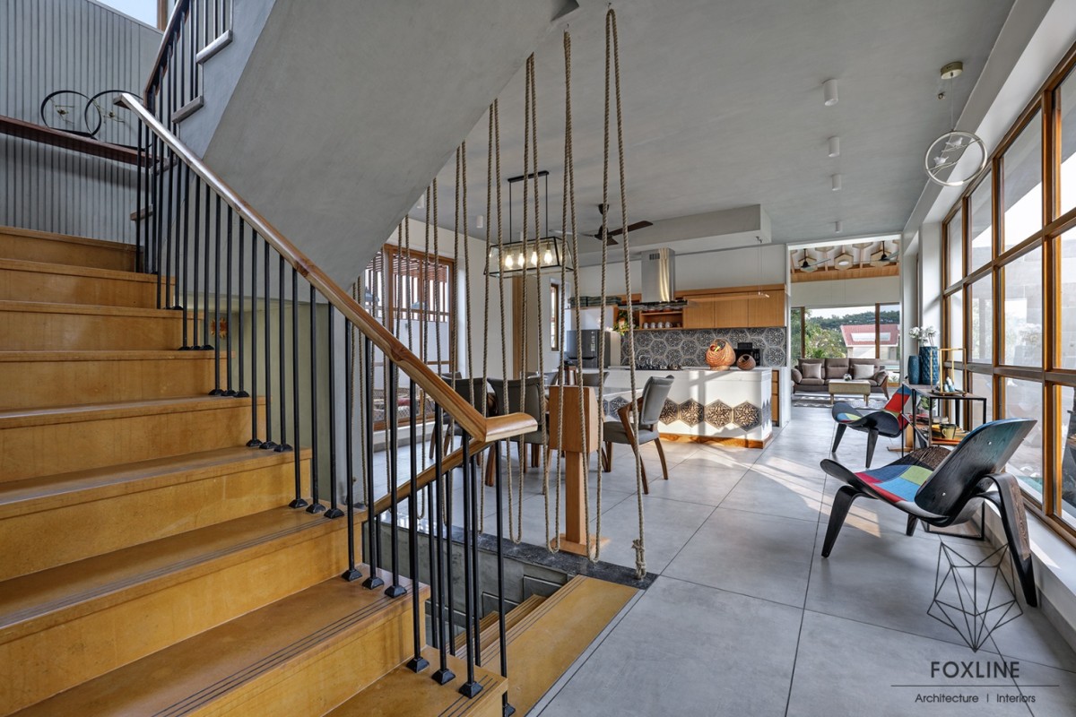 Passage to staircase of Weekend Home by  Foxline Architects & Interiors