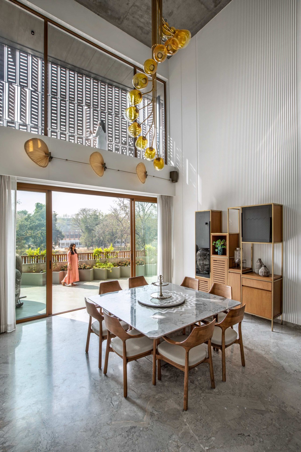 Dining of Aarti Villas by Dipen Gada & Associates