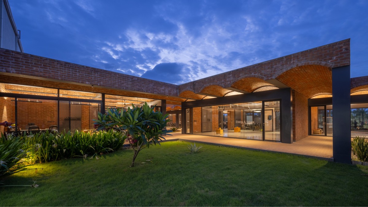 Dusk light lawn view of Metallic Bellows by KSM Architecture