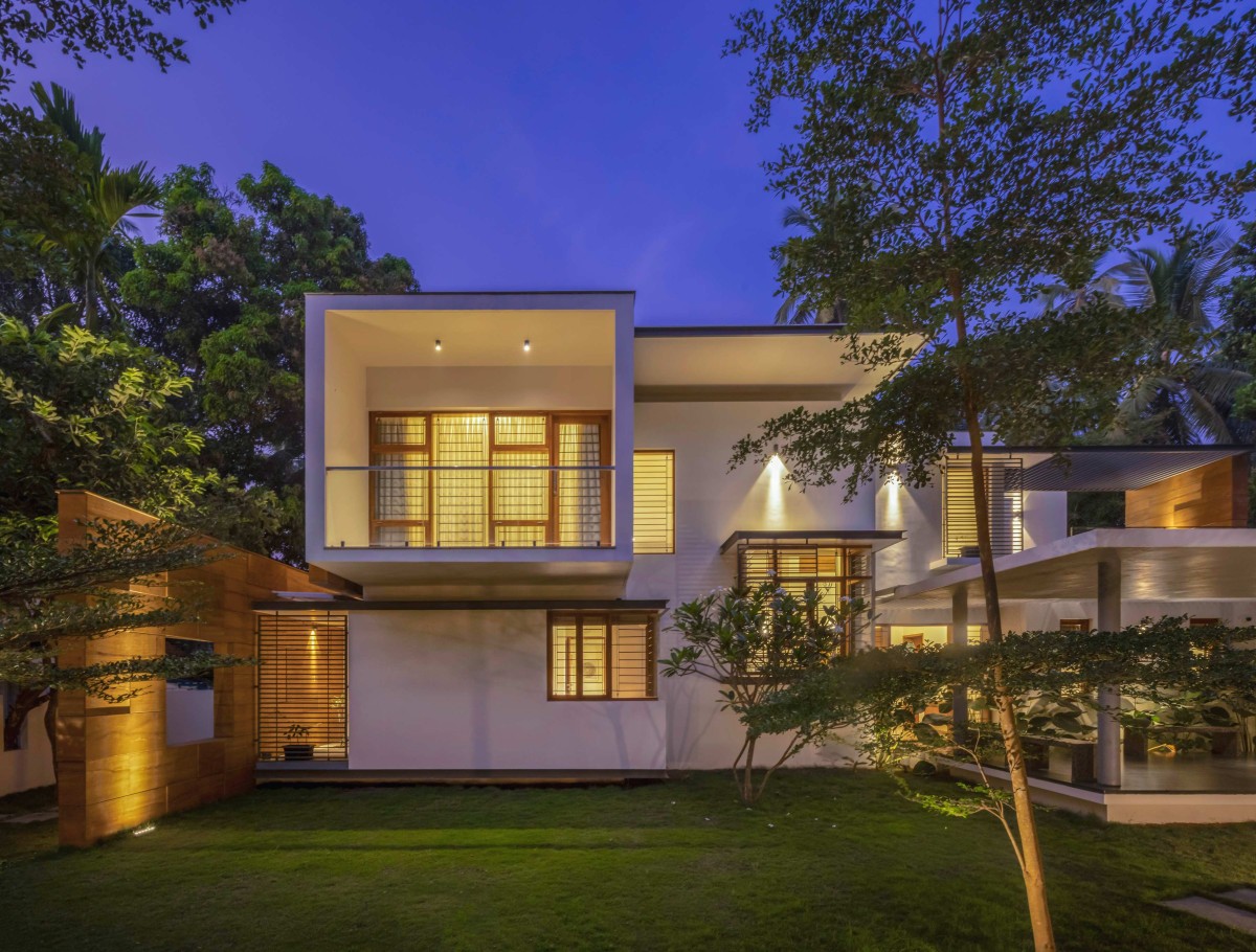 Dusk light exterior view of Float-en-Fold House by architecture.SEED