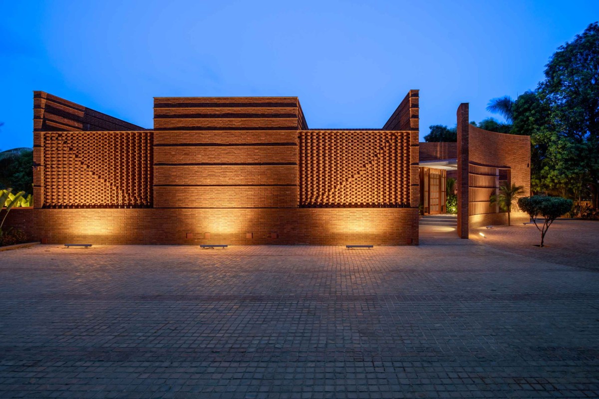 Dusk light exterior view of Sitish Parikh Farmhouse by Dipen Gada and Associates