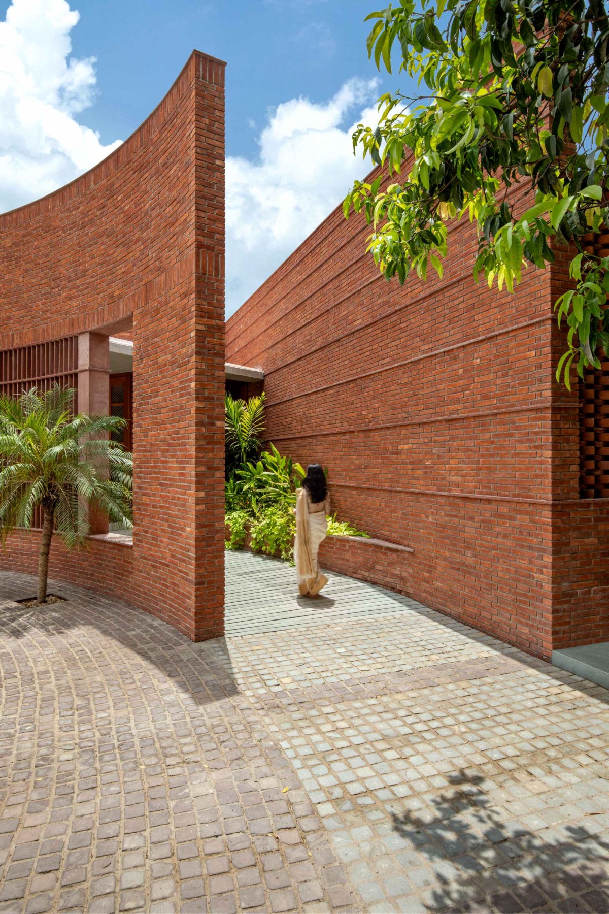 Exterior view of Sitish Parikh Farmhouse by Dipen Gada and Associates