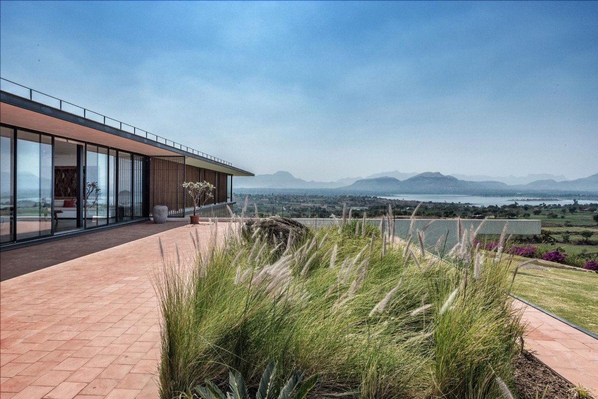 Deck view of House with the Soaring Rock by SPASM Design Architects